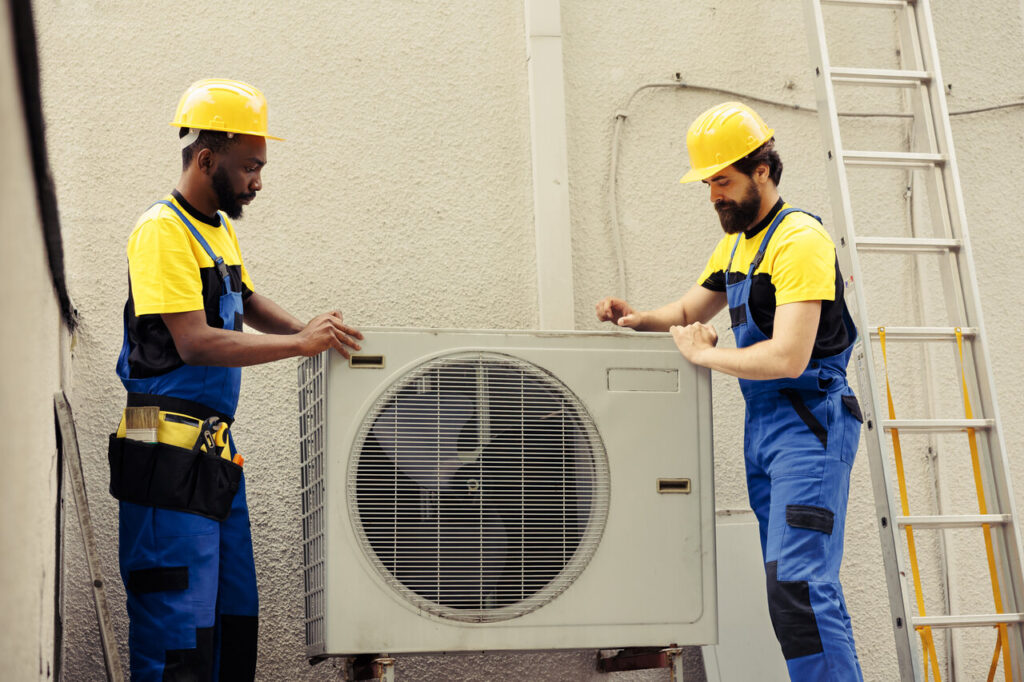 rsz technicians teamworking on hvac system 2023 11 27 04 59 51 utc