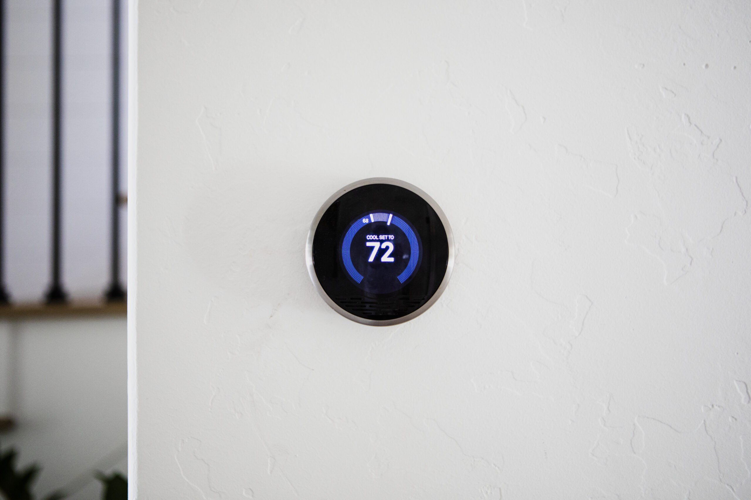 Digital modern thermostat at home